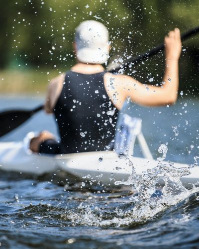 Athlete Rowing Kayak